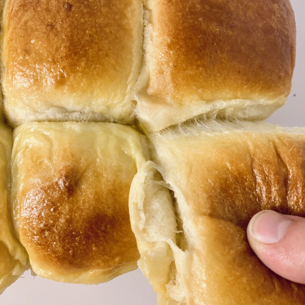 Full recipe + video tutorial on how to make Sourdough Hawaiian Rolls. This recipe is like no other - featuring a tangzhong (made with pineapple juice!) and a sweet stiff starter. This unique version of a Hawaiian roll is hands-down the best out there.