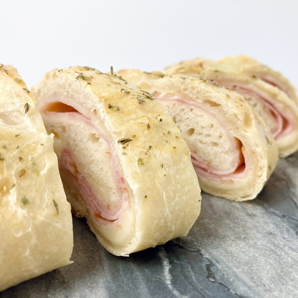 Sourdough ham and swiss Stromboli