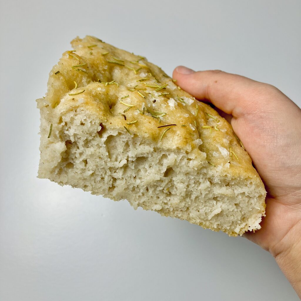 Full recipe + video tutorial detailing how to make Gluten-Free Sourdough Focaccia! Did you know it is possible to make gluten-free sourdough? This recipe is wildly easy and tastes SO good.